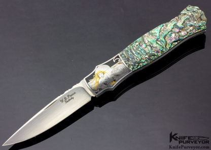 Knife Maker: W. D. Pease, Engraved by: Lisa Tomlin, it features: Green Abalone and is named the "Mermaid" and is a Lockback knife