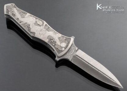 Jurgen Schanz Custom Knife Liner Lock Flipper Dagger Dinosaur vs Comic Book Hero Engraved by Anja Dammenhayn - Image 4