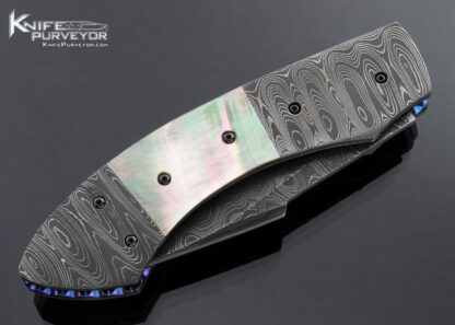 Jim Minnick Custom Knife Ladder Pattern Damascus and Black Lip Tahitian Pearl Automatic Linerlock - Image 3