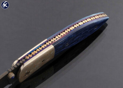 Rick Dunkerley Custom Knife Damascus and Mokume with Dyed Giraffe Bone Linerlock - Image 5